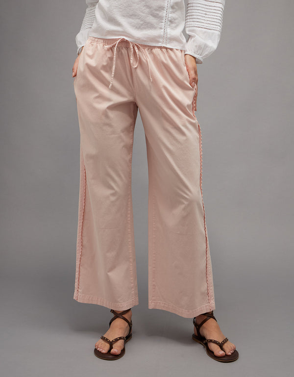 Pantalón de pierna ancha de talle bajo. - Rosa
