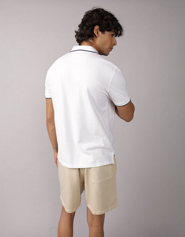 Polo de Piqué Elástico con Apariencia Desgastada para Hombre - Blanco